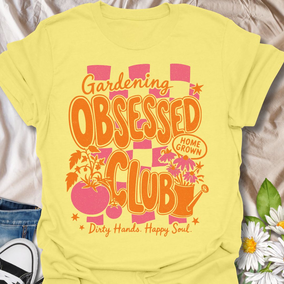 This Gardening Obsessed Club t-shirt is made for gardeners who know dirty hands, homegrown plants, and a happy soul go together perfectly. Featuring bold retro orange lettering, pink checkerboard accents, tomatoes, flowers, a watering can, and playful garden details, this design has a bright vintage-inspired feel full of personality. Perfect for gardeners, plant lovers, vegetable growers, flower fans, cottagecore style lovers, and anyone proudly part of the gardening obsessed club.
