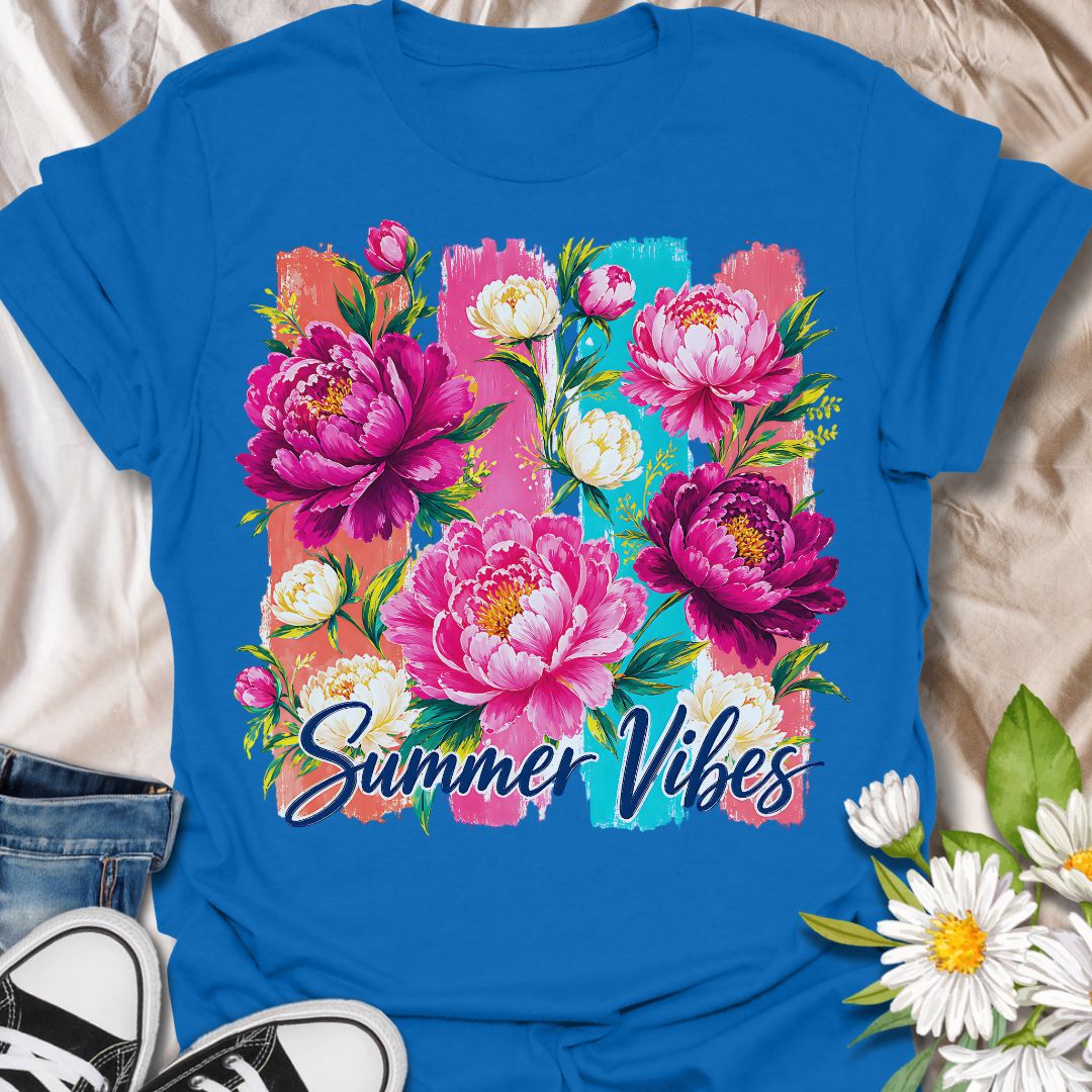 This Summer Vibes t-shirt is made for flower lovers who want a bright, cheerful design full of colour and warm-weather energy. Featuring bold pink peonies, soft cream blossoms, leafy greenery, painterly brushstroke panels, and flowing Summer Vibes lettering, this design has a fresh floral look that feels joyful and eye-catching. Perfect for garden lovers, flower fans, botanical style lovers, cottagecore outfits, summer wardrobes, and anyone who loves vibrant floral artwork.
