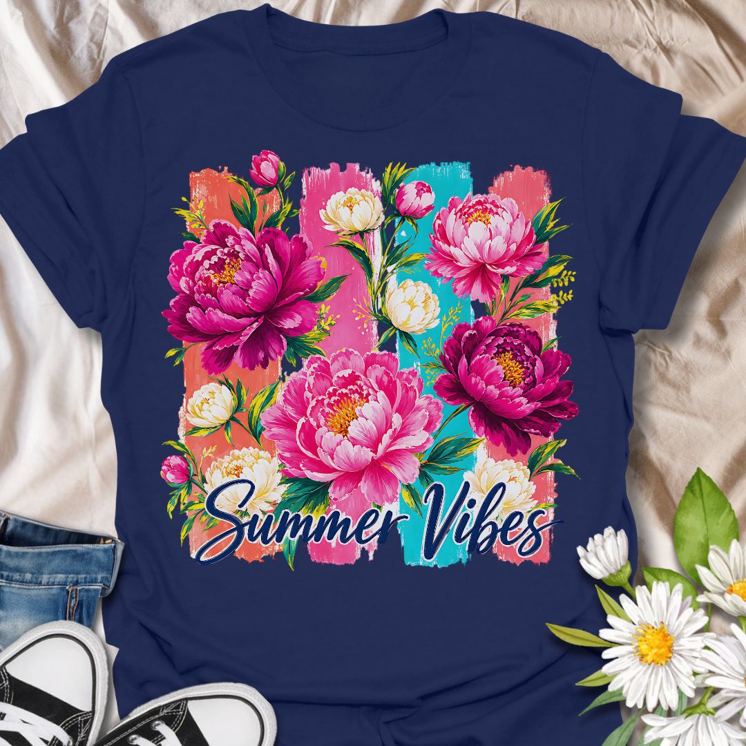 This Summer Vibes t-shirt is made for flower lovers who want a bright, cheerful design full of colour and warm-weather energy. Featuring bold pink peonies, soft cream blossoms, leafy greenery, painterly brushstroke panels, and flowing Summer Vibes lettering, this design has a fresh floral look that feels joyful and eye-catching. Perfect for garden lovers, flower fans, botanical style lovers, cottagecore outfits, summer wardrobes, and anyone who loves vibrant floral artwork.
