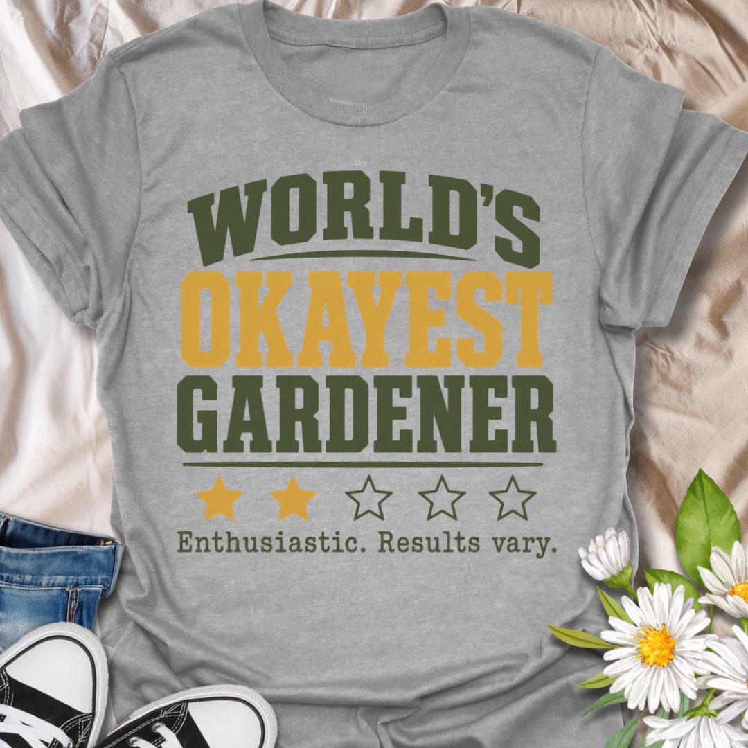 This World’s Okayest Gardener t-shirt is made for gardeners who are enthusiastic, optimistic, and not always guaranteed perfect results. Featuring bold varsity-style lettering, star rating details, and the funny phrase enthusiastic, results vary, this design has a relatable garden-humor feel for everyday wear. Perfect for plant lovers, beginner gardeners, backyard growers, allotment keepers, plant moms, plant dads, and anyone proudly doing their best in the garden.