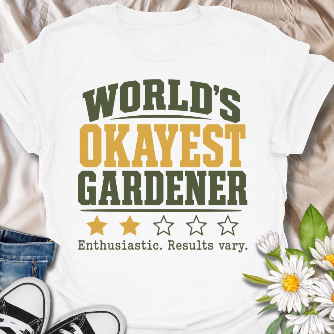 This World’s Okayest Gardener t-shirt is made for gardeners who are enthusiastic, optimistic, and not always guaranteed perfect results. Featuring bold varsity-style lettering, star rating details, and the funny phrase enthusiastic, results vary, this design has a relatable garden-humor feel for everyday wear. Perfect for plant lovers, beginner gardeners, backyard growers, allotment keepers, plant moms, plant dads, and anyone proudly doing their best in the garden.