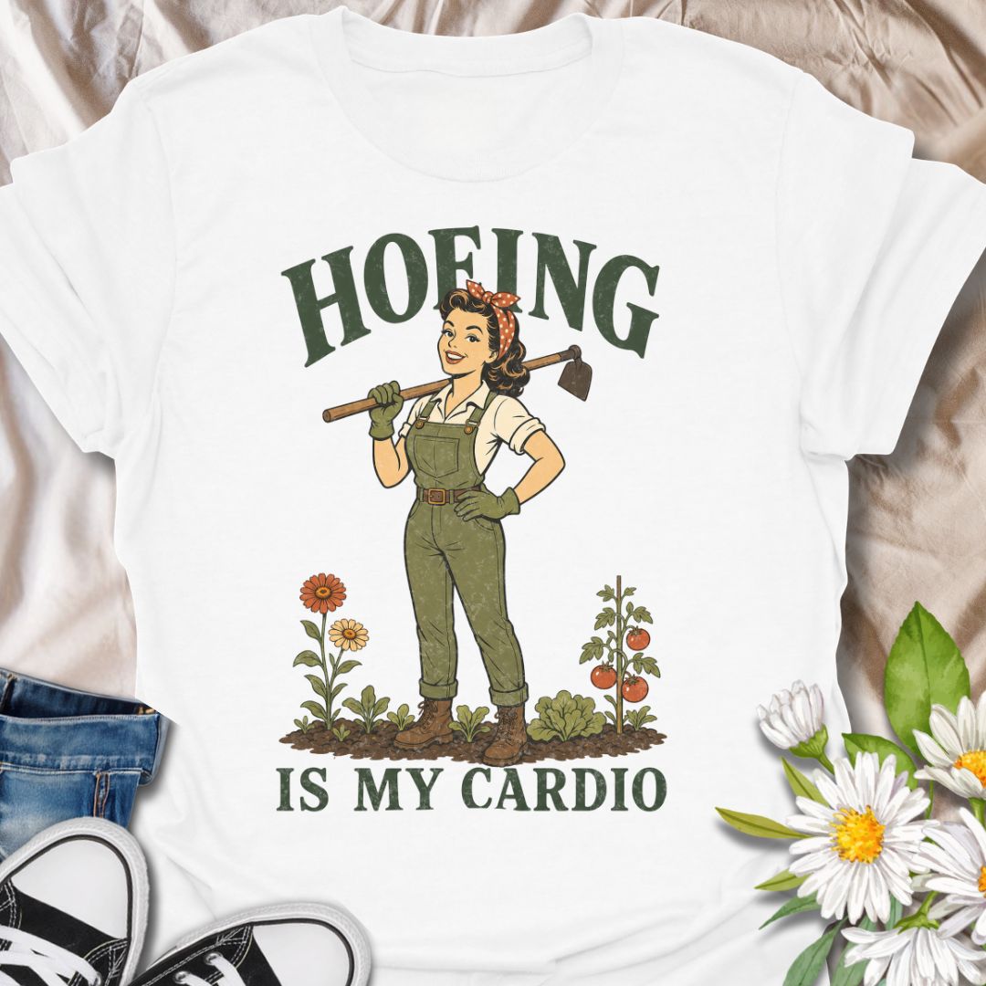 This Hoeing Is My Cardio t-shirt is made for gardeners who know working the soil, pulling weeds, and tending the vegetable patch absolutely counts as exercise. Featuring a vintage-style gardener holding a hoe, with flowers, tomatoes, greenery, and bold retro lettering, this design has a funny garden-humor feel with classic pin-up charm. Perfect for gardeners, plant lovers, backyard growers, vegetable gardeners, flower fans, homesteaders, and anyone who gets their workout in the garden.