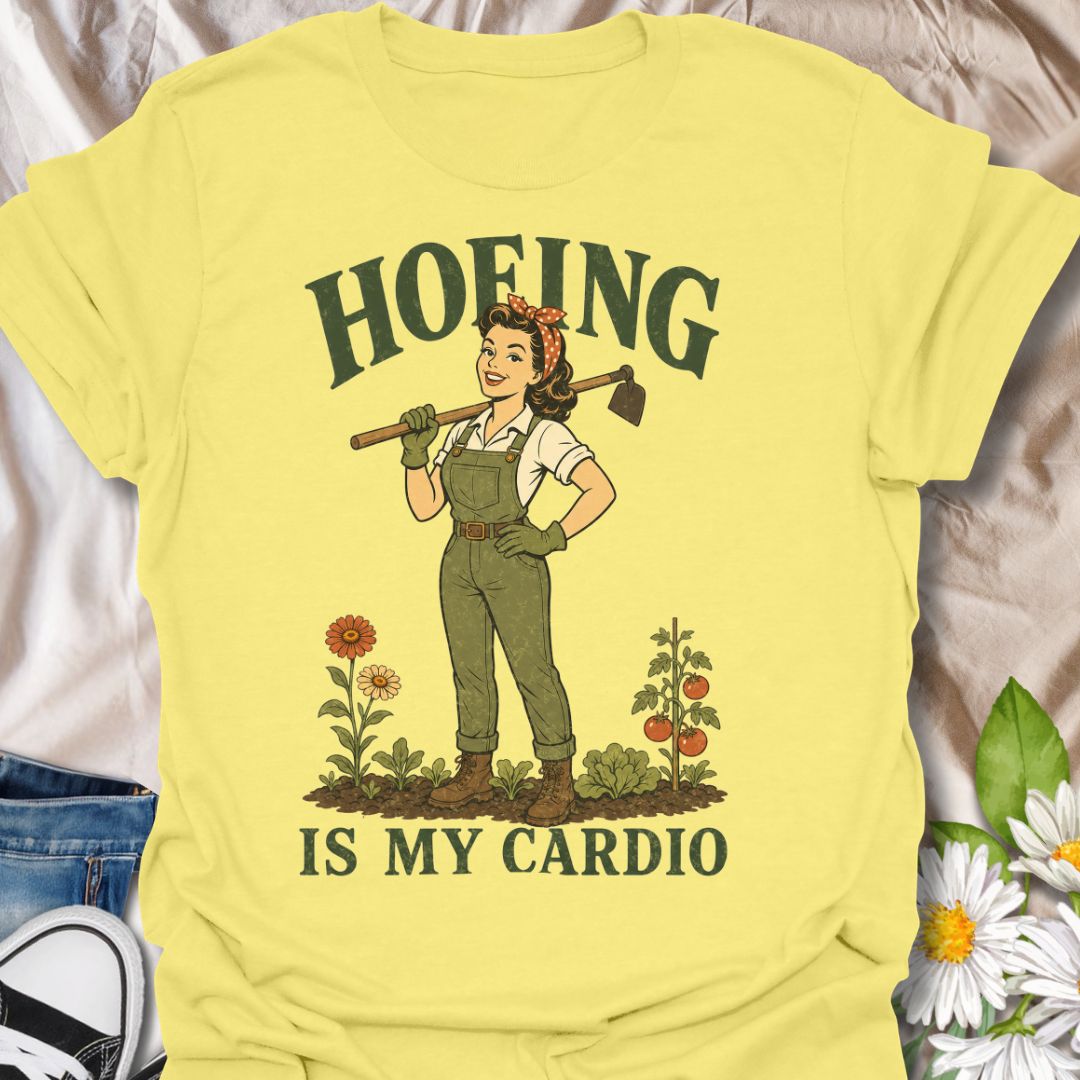 This Hoeing Is My Cardio t-shirt is made for gardeners who know working the soil, pulling weeds, and tending the vegetable patch absolutely counts as exercise. Featuring a vintage-style gardener holding a hoe, with flowers, tomatoes, greenery, and bold retro lettering, this design has a funny garden-humor feel with classic pin-up charm. Perfect for gardeners, plant lovers, backyard growers, vegetable gardeners, flower fans, homesteaders, and anyone who gets their workout in the garden.