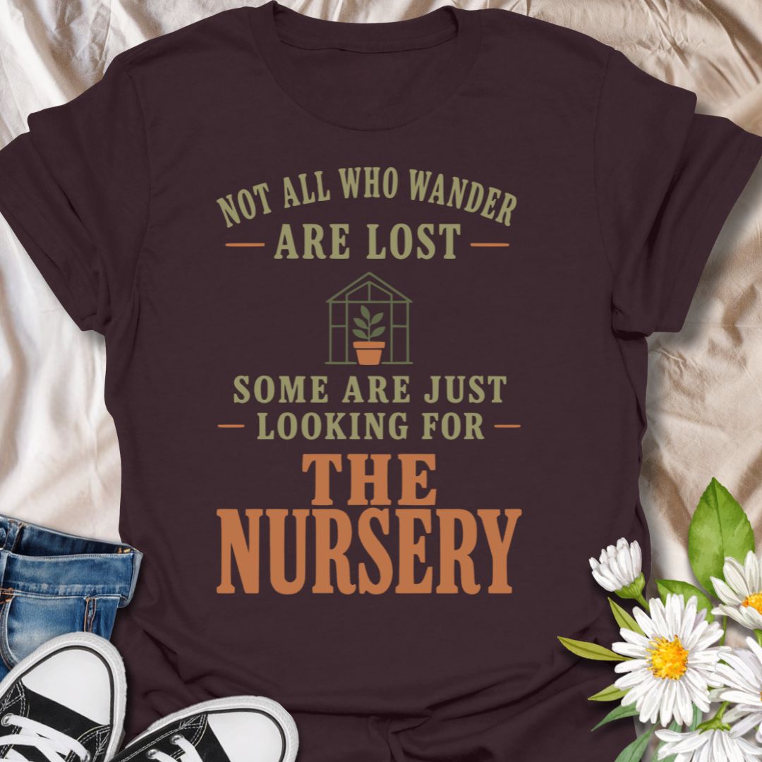 This Not All Who Wander Are Lost t-shirt is made for plant lovers who know some people are simply searching for the nearest garden nursery. Featuring bold vintage-style typography, a small greenhouse and potted plant detail, and warm earthy colors, this design has a funny plant-lover twist on a classic quote. Perfect for gardeners, plant moms, plant dads, nursery shoppers, houseplant collectors, and anyone who can never resist a trip to the Nursery.