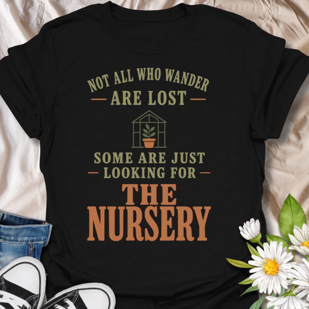 This Not All Who Wander Are Lost t-shirt is made for plant lovers who know some people are simply searching for the nearest garden nursery. Featuring bold vintage-style typography, a small greenhouse and potted plant detail, and warm earthy colors, this design has a funny plant-lover twist on a classic quote. Perfect for gardeners, plant moms, plant dads, nursery shoppers, houseplant collectors, and anyone who can never resist a trip to the Nursery.