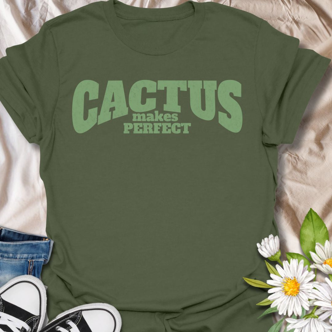 This Cactus Makes Perfect t-shirt is made for plant lovers who have a soft spot for prickly plants, desert greenery, and cute plant puns. Featuring bold vintage-style text in soft green with the phrase Cactus Makes Perfect, this simple design has a clean, funny botanical feel that is easy to wear every day. Perfect for cactus lovers, succulent fans, plant moms, plant dads, houseplant collectors, and anyone who thinks a little prickly personality is part of the charm.