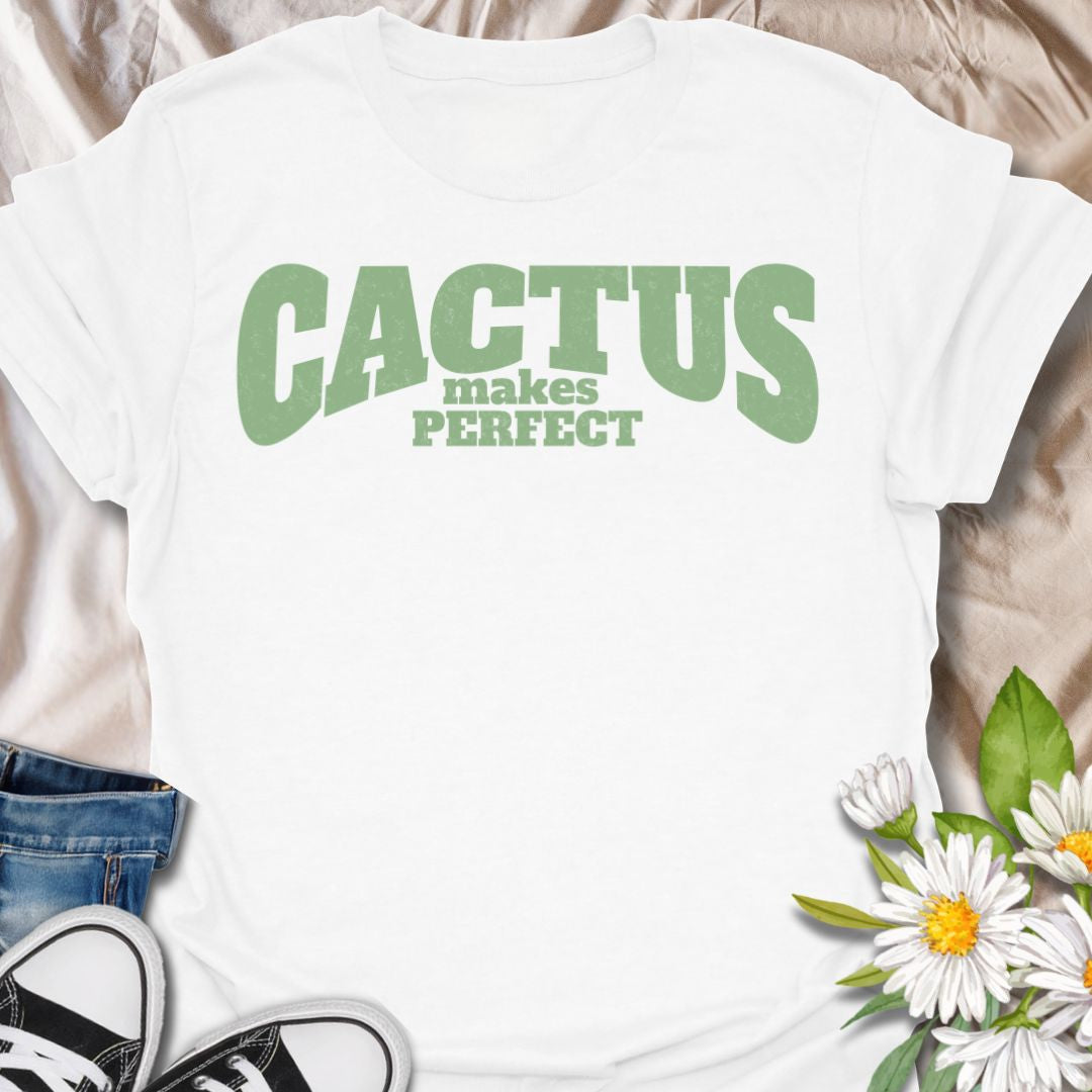 This Cactus Makes Perfect t-shirt is made for plant lovers who have a soft spot for prickly plants, desert greenery, and cute plant puns. Featuring bold vintage-style text in soft green with the phrase Cactus Makes Perfect, this simple design has a clean, funny botanical feel that is easy to wear every day. Perfect for cactus lovers, succulent fans, plant moms, plant dads, houseplant collectors, and anyone who thinks a little prickly personality is part of the charm.