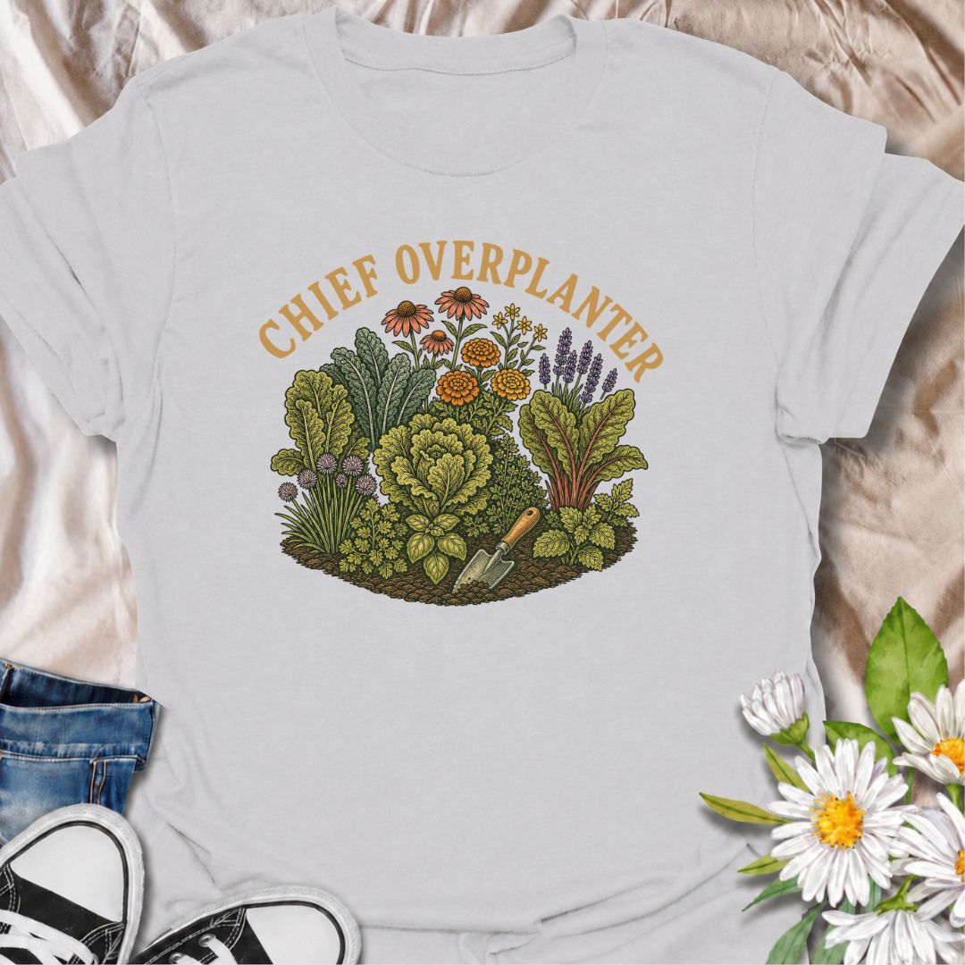 A funny gardening T-shirt for anyone who sees an empty patch of soil and immediately fills every inch of it. The “Chief Overplanter” phrase is perfect for enthusiastic gardeners who always squeeze in one more flower, herb, or vegetable. Featuring a lush garden bed packed with greenery and blooms, this design works especially well for cottage gardeners, backyard growers, and green-thumbed plant lovers. It makes a fun gift for gardeners who treat recommended spacing as more of a suggestion than a rule. Ideal 