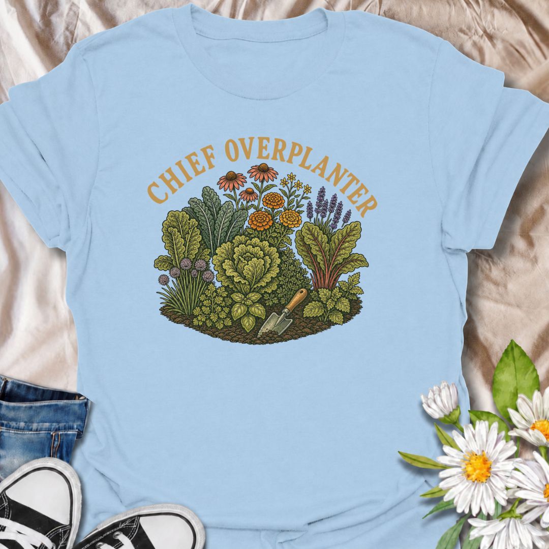A funny gardening T-shirt for anyone who sees an empty patch of soil and immediately fills every inch of it. The “Chief Overplanter” phrase is perfect for enthusiastic gardeners who always squeeze in one more flower, herb, or vegetable. Featuring a lush garden bed packed with greenery and blooms, this design works especially well for cottage gardeners, backyard growers, and green-thumbed plant lovers. It makes a fun gift for gardeners who treat recommended spacing as more of a suggestion than a rule. Ideal 