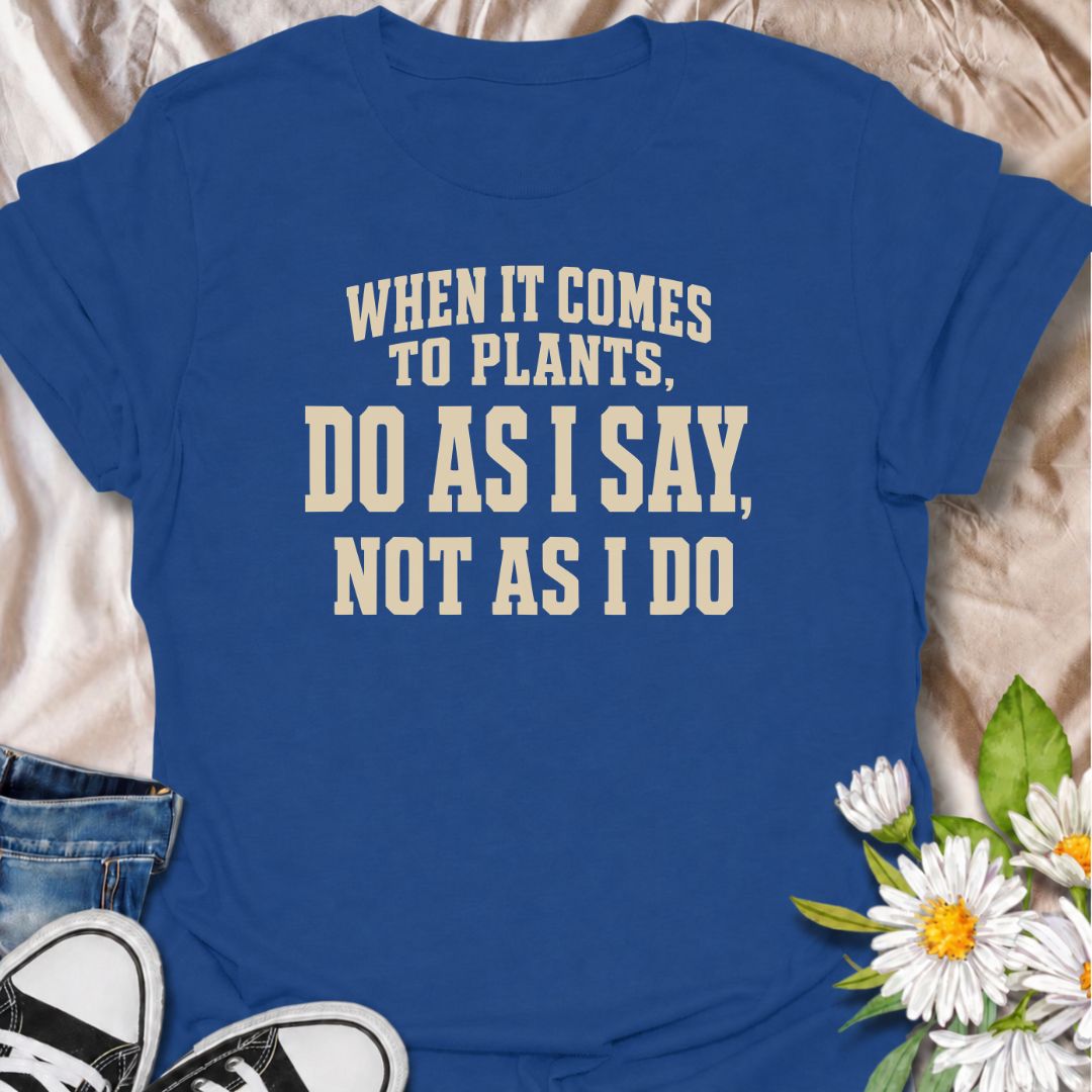 A funny plant T-shirt for anyone who gives excellent houseplant advice and then completely ignores it at home. The phrase “When It Comes to Plants, Do as I Say, Not as I Do” delivers dry, self-deprecating humor that experienced plant parents will recognize immediately. Perfect for houseplant collectors, indoor gardeners, and plant lovers whose own growing habits do not always match their expertise. The bold typography keeps the design clean, readable, and easy to wear. A great gift for plant enthusiasts, nu