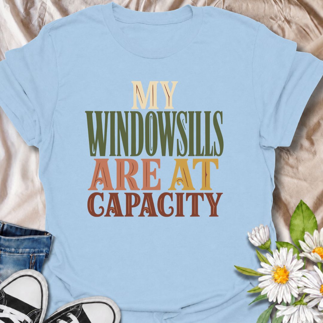 A funny plant T-shirt for anyone whose best windowsills are already completely claimed by houseplants. The phrase “My Windowsills Are at Capacity” is perfect for plant parents, indoor gardeners, and collectors who keep finding room for one more pot anyway. Its bold retro typography makes the design easy to read while keeping it simple and wearable. It makes a great gift for pothos lovers, houseplant collectors, and anyone with an ever-growing indoor jungle. Ideal for nursery trips, plant swaps, garden cente