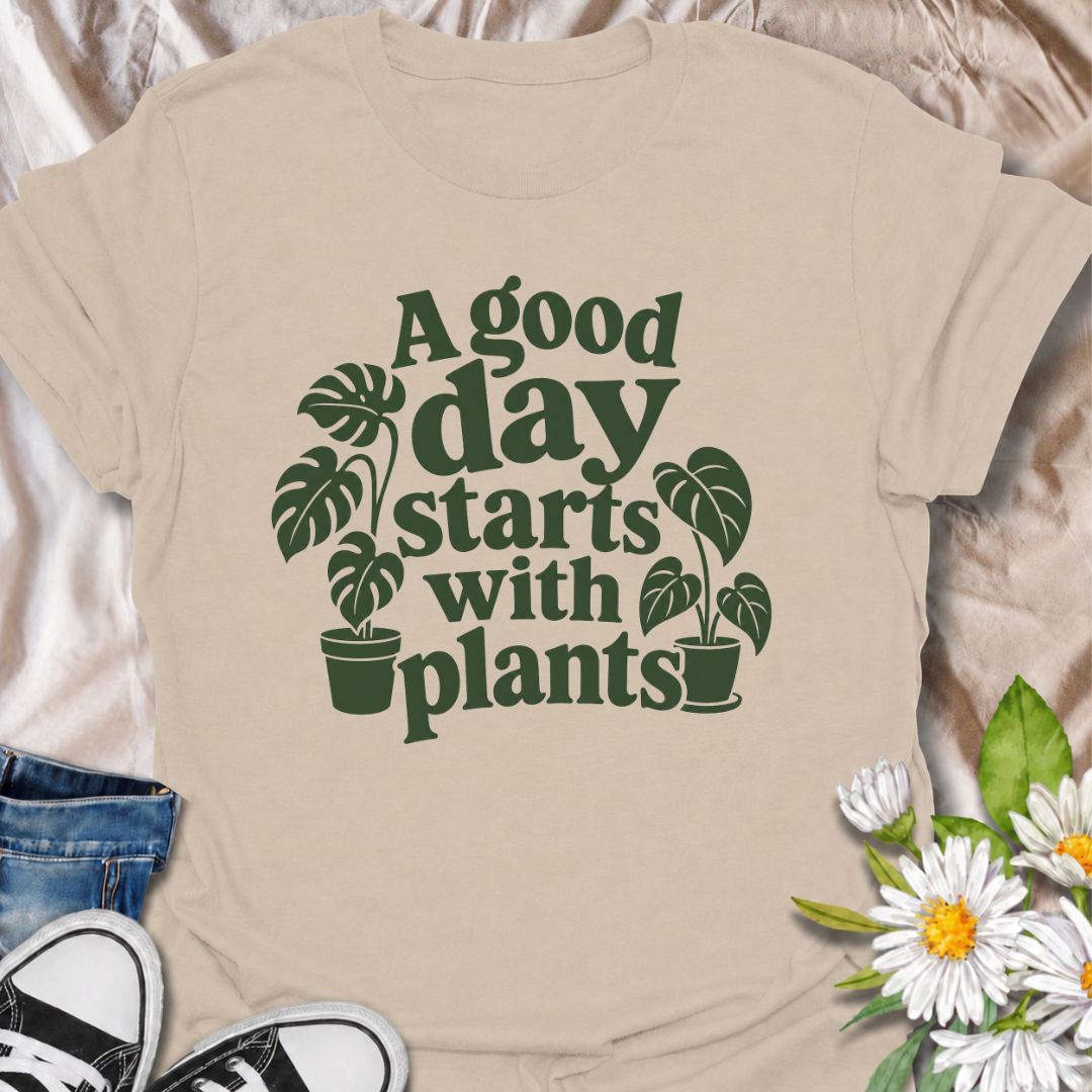 A cheerful plant T-shirt for anyone who believes the best days begin with a little greenery. The phrase “A Good Day Starts With Plants” pairs perfectly with the simple monstera-inspired artwork for a clean, easy-to-wear botanical look. It’s ideal for houseplant lovers, plant parents, indoor gardeners, and anyone who feels better surrounded by leaves. This design makes a lovely gift for plant collectors, nursery regulars, and lovers of cozy indoor jungles. Perfect for everyday wear, plant shopping, greenhous