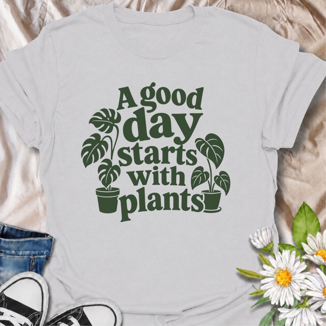 A cheerful plant T-shirt for anyone who believes the best days begin with a little greenery. The phrase “A Good Day Starts With Plants” pairs perfectly with the simple monstera-inspired artwork for a clean, easy-to-wear botanical look. It’s ideal for houseplant lovers, plant parents, indoor gardeners, and anyone who feels better surrounded by leaves. This design makes a lovely gift for plant collectors, nursery regulars, and lovers of cozy indoor jungles. Perfect for everyday wear, plant shopping, greenhous