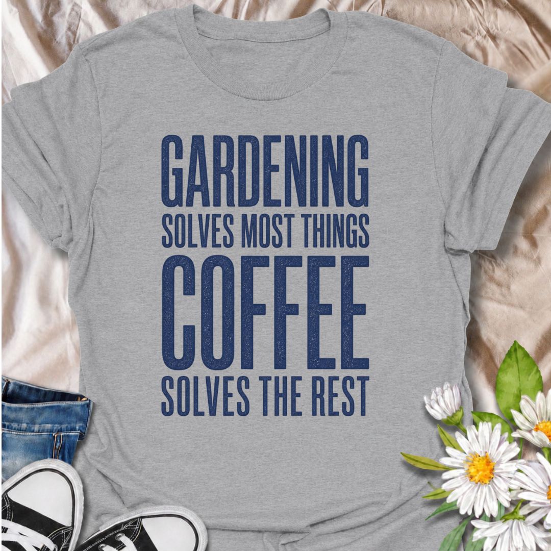 A funny gardening T-shirt for anyone who believes most problems can be improved with time in the garden and a good cup of coffee. The phrase “Gardening Solves Most Things. Coffee Solves the Rest.” combines two everyday favorites in one bold, easy-to-read design. It’s perfect for gardeners, plant lovers, and coffee drinkers who enjoy a little dry humor. This makes a great gift for backyard gardeners, flower growers, vegetable gardeners, and anyone who starts the day with caffeine and ends it with dirt under 