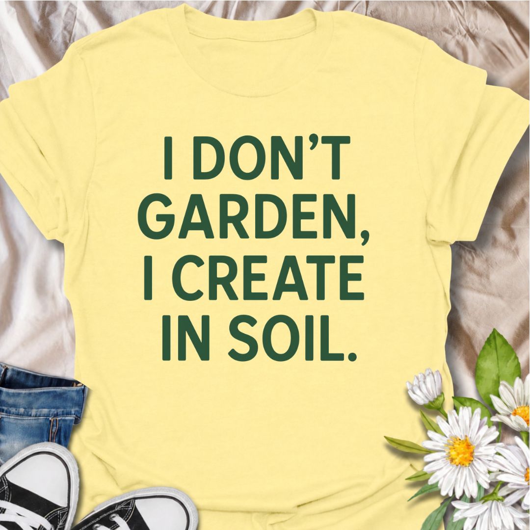 A bold gardening T-shirt for anyone who sees the garden as a place to make, experiment, and grow. The phrase “I Don’t Garden, I Create in Soil” gives gardening a more creative, expressive twist while keeping the design clean and modern. It is perfect for gardeners, plant lovers, backyard growers, and anyone who treats planting as their favorite form of creativity. The simple typography makes it easy to wear and easy to pair with everyday outfits. A great gift for gardeners who see soil as their canvas.
