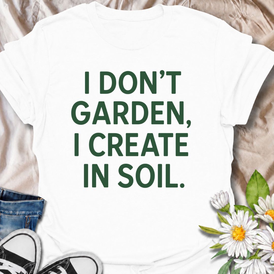 A bold gardening T-shirt for anyone who sees the garden as a place to make, experiment, and grow. The phrase “I Don’t Garden, I Create in Soil” gives gardening a more creative, expressive twist while keeping the design clean and modern. It is perfect for gardeners, plant lovers, backyard growers, and anyone who treats planting as their favorite form of creativity. The simple typography makes it easy to wear and easy to pair with everyday outfits. A great gift for gardeners who see soil as their canvas.