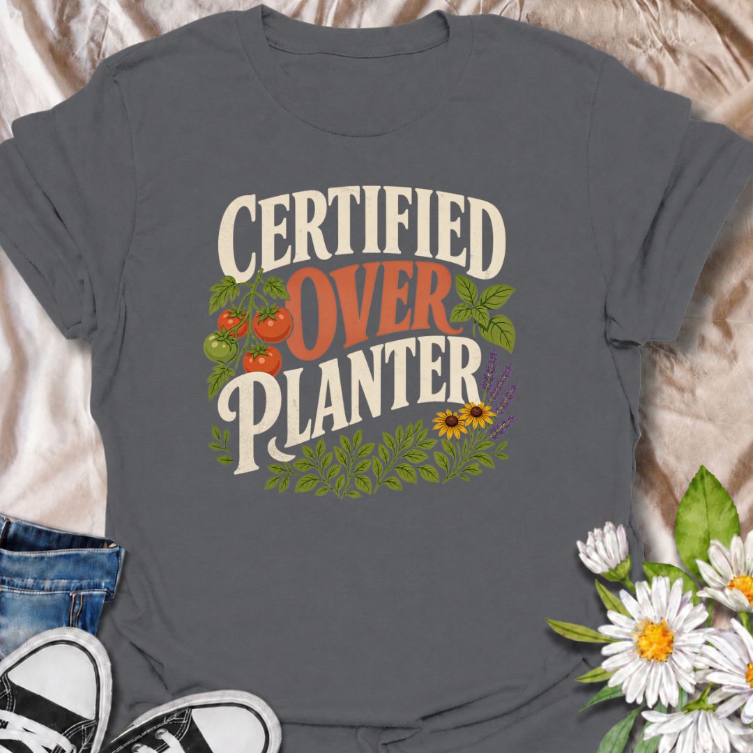 A funny gardening T-shirt for anyone who believes recommended spacing is more of a suggestion than a rule. The bold “Certified Overplanter” phrase is paired with tomatoes, herbs, flowers, and leafy greenery for a colorful garden-lover design. It is perfect for vegetable gardeners, cottage gardeners, backyard growers, and anyone who always squeezes in one more plant. The design makes a great gift for gardeners who proudly embrace a full, abundant garden. Ideal for garden days, nursery trips, farmers markets,
