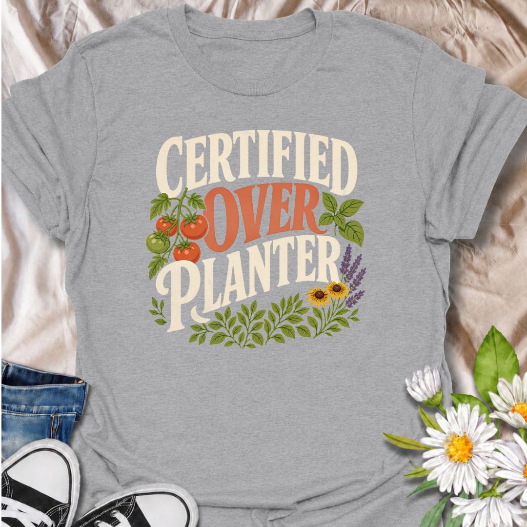 A funny gardening T-shirt for anyone who believes recommended spacing is more of a suggestion than a rule. The bold “Certified Overplanter” phrase is paired with tomatoes, herbs, flowers, and leafy greenery for a colorful garden-lover design. It is perfect for vegetable gardeners, cottage gardeners, backyard growers, and anyone who always squeezes in one more plant. The design makes a great gift for gardeners who proudly embrace a full, abundant garden. Ideal for garden days, nursery trips, farmers markets,