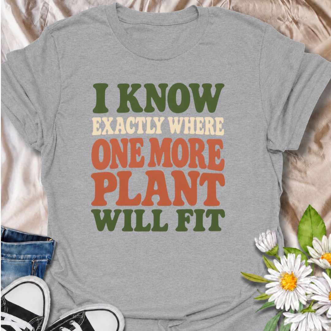 A funny plant T-shirt for anyone who can always find space for just one more houseplant. The phrase “I Know Exactly Where One More Plant Will Fit” captures the mindset of plant collectors, indoor gardeners, and nursery regulars perfectly. Its bold retro typography gives the design a clean, wearable look while keeping the joke easy to read. It makes a great gift for plant parents, houseplant lovers, and anyone whose indoor jungle keeps expanding. Ideal for nursery trips, plant swaps, garden centers, or every