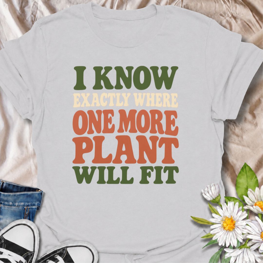 A funny plant T-shirt for anyone who can always find space for just one more houseplant. The phrase “I Know Exactly Where One More Plant Will Fit” captures the mindset of plant collectors, indoor gardeners, and nursery regulars perfectly. Its bold retro typography gives the design a clean, wearable look while keeping the joke easy to read. It makes a great gift for plant parents, houseplant lovers, and anyone whose indoor jungle keeps expanding. Ideal for nursery trips, plant swaps, garden centers, or every