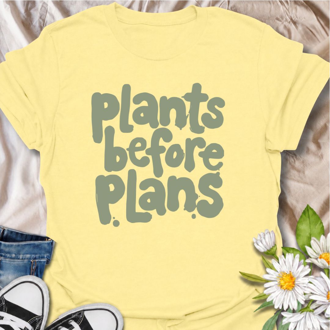 A funny plant T-shirt for anyone whose priorities are clear: plants first, plans later. The phrase “Plants Before Plans” is simple, playful, and instantly relatable for houseplant lovers, plant parents, and indoor gardeners. Its chunky retro typography gives the design a casual, modern feel that is easy to wear. It makes a great gift for plant collectors, nursery regulars, and anyone who would happily cancel plans for a quiet day with their plants. Perfect for plant shopping, greenhouse visits, relaxed week