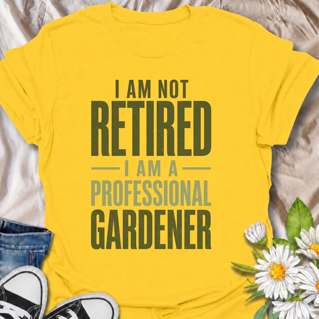 A funny gardening T-shirt for anyone who has retired from work but definitely not from the garden. The phrase “I Am Not Retired, I Am a Professional Gardener” turns retirement into a full-time gardening promotion with dry, relatable humor. Its bold typography keeps the design clean, readable, and easy to wear. It makes a great gift for retired gardeners, allotment lovers, backyard growers, and anyone who now has more time to spend outdoors. Ideal for garden days, nursery trips, farmers markets, or everyday 