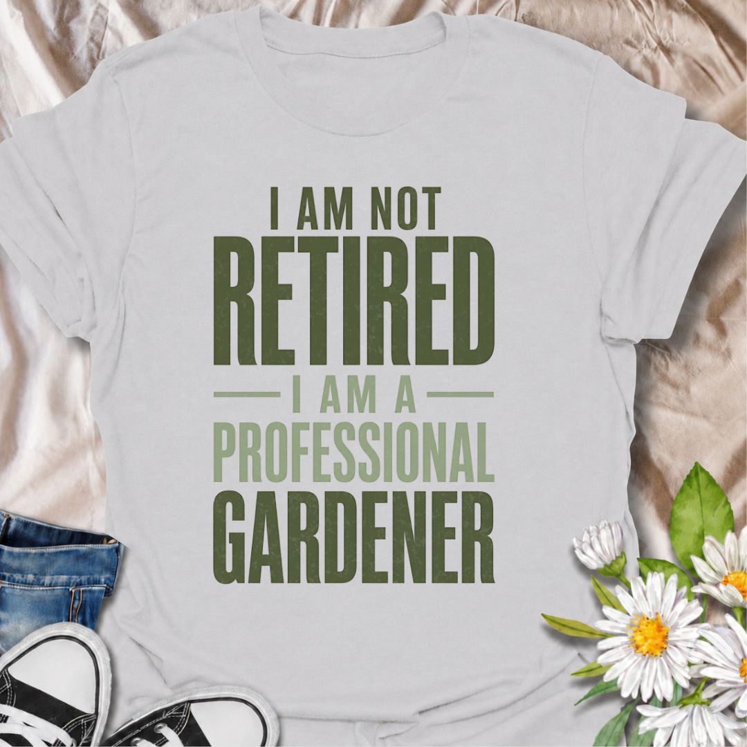 A funny gardening T-shirt for anyone who has retired from work but definitely not from the garden. The phrase “I Am Not Retired, I Am a Professional Gardener” turns retirement into a full-time gardening promotion with dry, relatable humor. Its bold typography keeps the design clean, readable, and easy to wear. It makes a great gift for retired gardeners, allotment lovers, backyard growers, and anyone who now has more time to spend outdoors. Ideal for garden days, nursery trips, farmers markets, or everyday 