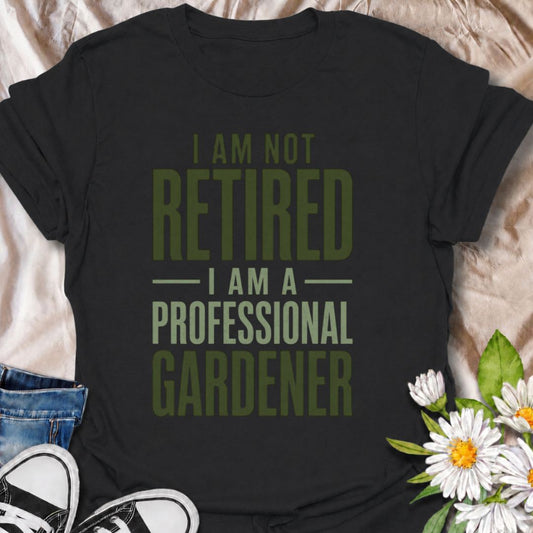 A funny gardening T-shirt for anyone who has retired from work but definitely not from the garden. The phrase “I Am Not Retired, I Am a Professional Gardener” turns retirement into a full-time gardening promotion with dry, relatable humor. Its bold typography keeps the design clean, readable, and easy to wear. It makes a great gift for retired gardeners, allotment lovers, backyard growers, and anyone who now has more time to spend outdoors. Ideal for garden days, nursery trips, farmers markets, or everyday 