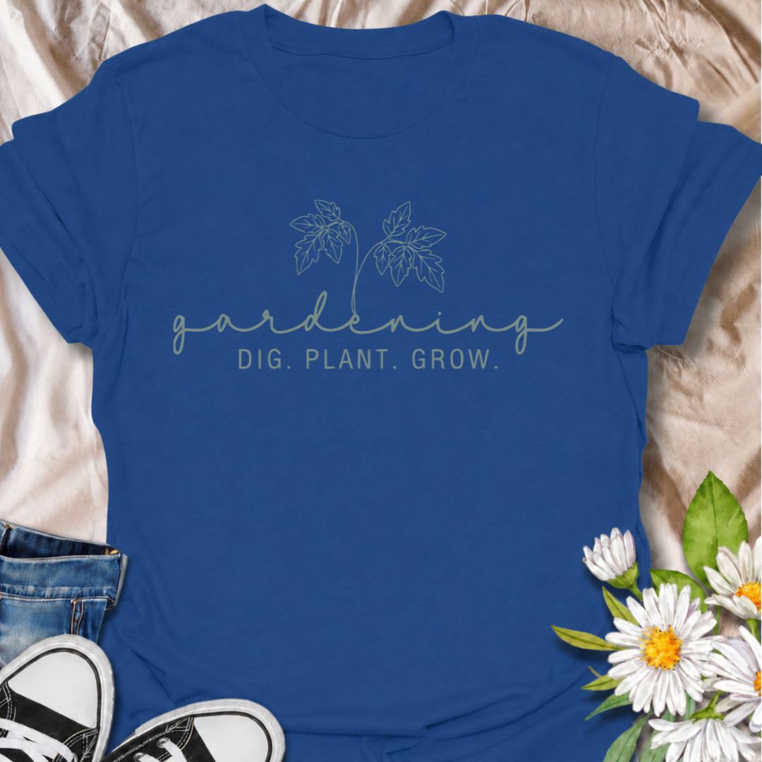A simple gardening T-shirt for anyone who feels most at home with their hands in the soil. The understated “Gardening — Dig. Plant. Grow.” design combines delicate botanical line art with a clean, relaxed look. It is perfect for gardeners, plant lovers, backyard growers, and anyone who enjoys the quiet rhythm of planting and growing. The softer style makes it especially easy to wear while still clearly speaking to the gardening niche. A lovely gift for flower gardeners, vegetable growers, and anyone who wou