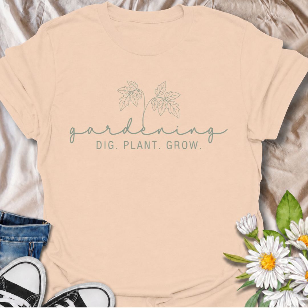 A simple gardening T-shirt for anyone who feels most at home with their hands in the soil. The understated “Gardening — Dig. Plant. Grow.” design combines delicate botanical line art with a clean, relaxed look. It is perfect for gardeners, plant lovers, backyard growers, and anyone who enjoys the quiet rhythm of planting and growing. The softer style makes it especially easy to wear while still clearly speaking to the gardening niche. A lovely gift for flower gardeners, vegetable growers, and anyone who wou