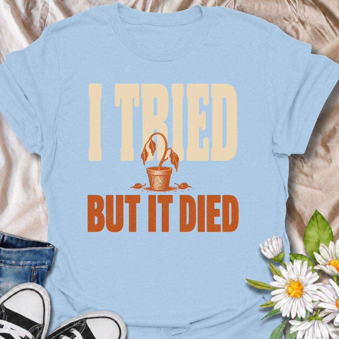 A funny plant T-shirt for anyone who gave it their best shot and still ended up with a very unhappy houseplant. The phrase “I Tried But It Died” delivers simple, self-deprecating plant humor that new growers and experienced plant parents alike will recognize. Featuring a wilted potted plant, the design keeps the joke bold, clear, and easy to wear. It makes a great gift for houseplant lovers, accidental plant killers, and anyone whose green thumb is still a work in progress. Ideal for nursery trips, plant sw