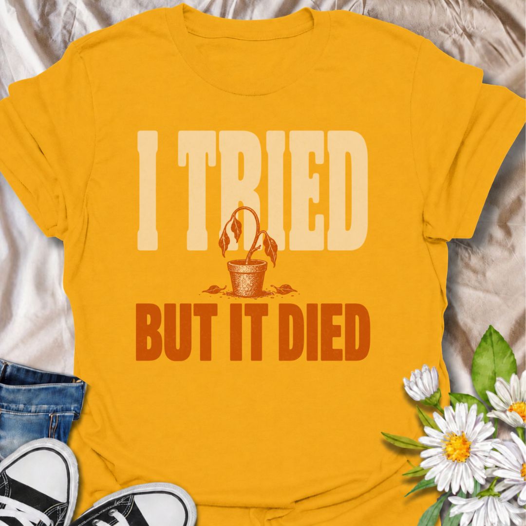 A funny plant T-shirt for anyone who gave it their best shot and still ended up with a very unhappy houseplant. The phrase “I Tried But It Died” delivers simple, self-deprecating plant humor that new growers and experienced plant parents alike will recognize. Featuring a wilted potted plant, the design keeps the joke bold, clear, and easy to wear. It makes a great gift for houseplant lovers, accidental plant killers, and anyone whose green thumb is still a work in progress. Ideal for nursery trips, plant sw