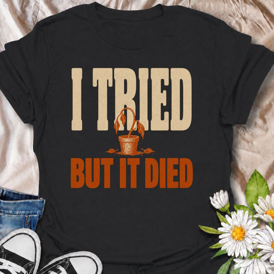 A funny plant T-shirt for anyone who gave it their best shot and still ended up with a very unhappy houseplant. The phrase “I Tried But It Died” delivers simple, self-deprecating plant humor that new growers and experienced plant parents alike will recognize. Featuring a wilted potted plant, the design keeps the joke bold, clear, and easy to wear. It makes a great gift for houseplant lovers, accidental plant killers, and anyone whose green thumb is still a work in progress. Ideal for nursery trips, plant sw