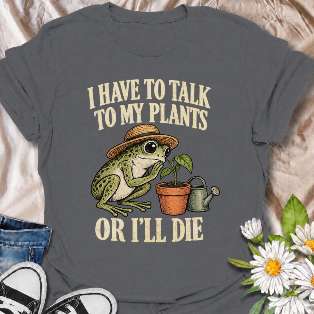A funny plant T-shirt for anyone who takes conversations with their houseplants very seriously. Featuring a wide-eyed frog in a garden hat leaning in toward a potted plant, this design gives the phrase “I Have to Talk to My Plants or I’ll Die” a playful, slightly absurd feel. It is perfect for plant parents, houseplant lovers, indoor gardeners, and anyone who treats their plants like part of the family. The design makes a fun gift for frog lovers, plant collectors, and people with an ever-growing indoor jun