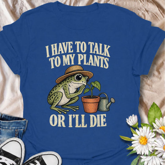 A funny plant T-shirt for anyone who takes conversations with their houseplants very seriously. Featuring a wide-eyed frog in a garden hat leaning in toward a potted plant, this design gives the phrase “I Have to Talk to My Plants or I’ll Die” a playful, slightly absurd feel. It is perfect for plant parents, houseplant lovers, indoor gardeners, and anyone who treats their plants like part of the family. The design makes a fun gift for frog lovers, plant collectors, and people with an ever-growing indoor jun