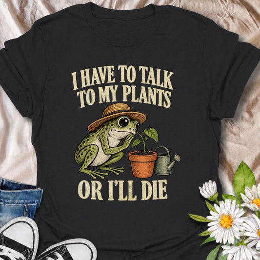 A funny plant T-shirt for anyone who takes conversations with their houseplants very seriously. Featuring a wide-eyed frog in a garden hat leaning in toward a potted plant, this design gives the phrase “I Have to Talk to My Plants or I’ll Die” a playful, slightly absurd feel. It is perfect for plant parents, houseplant lovers, indoor gardeners, and anyone who treats their plants like part of the family. The design makes a fun gift for frog lovers, plant collectors, and people with an ever-growing indoor jun