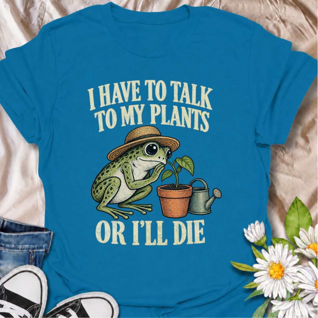 A funny plant T-shirt for anyone who takes conversations with their houseplants very seriously. Featuring a wide-eyed frog in a garden hat leaning in toward a potted plant, this design gives the phrase “I Have to Talk to My Plants or I’ll Die” a playful, slightly absurd feel. It is perfect for plant parents, houseplant lovers, indoor gardeners, and anyone who treats their plants like part of the family. The design makes a fun gift for frog lovers, plant collectors, and people with an ever-growing indoor jun