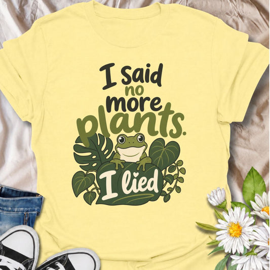 A funny plant T-shirt for anyone who has promised themselves they were done buying houseplants—and immediately proved otherwise. The phrase “I Said No More Plants. I Lied.” delivers simple, relatable humor that plant parents and nursery regulars will instantly understand. Featuring a cheerful frog surrounded by tropical leaves, the design feels playful, bright, and easy to wear. It makes a great gift for houseplant collectors, plant lovers, and anyone whose indoor jungle keeps expanding despite their best i