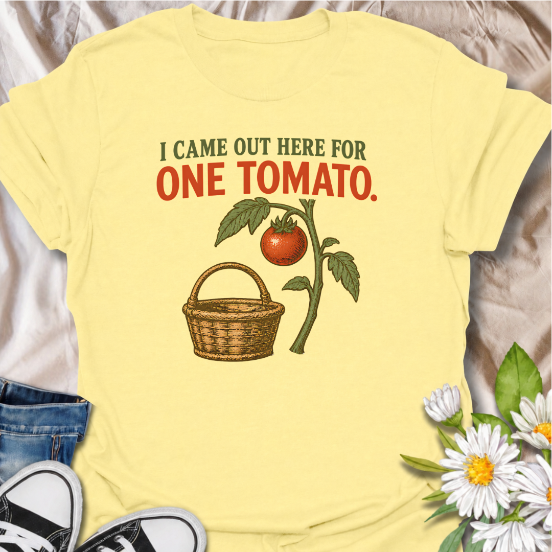 A funny gardening T-shirt for anyone who heads outside for one tomato and somehow gets distracted by everything else in the garden. The phrase “I Came Out Here for One Tomato” captures that familiar backyard-gardener moment with simple, relatable humor. Featuring a ripe tomato on the vine and a vintage-style harvest basket, the design feels warm, rustic, and easy to wear. It makes a great gift for tomato growers, vegetable gardeners, and anyone who spends harvest season wandering around the garden. Ideal fo