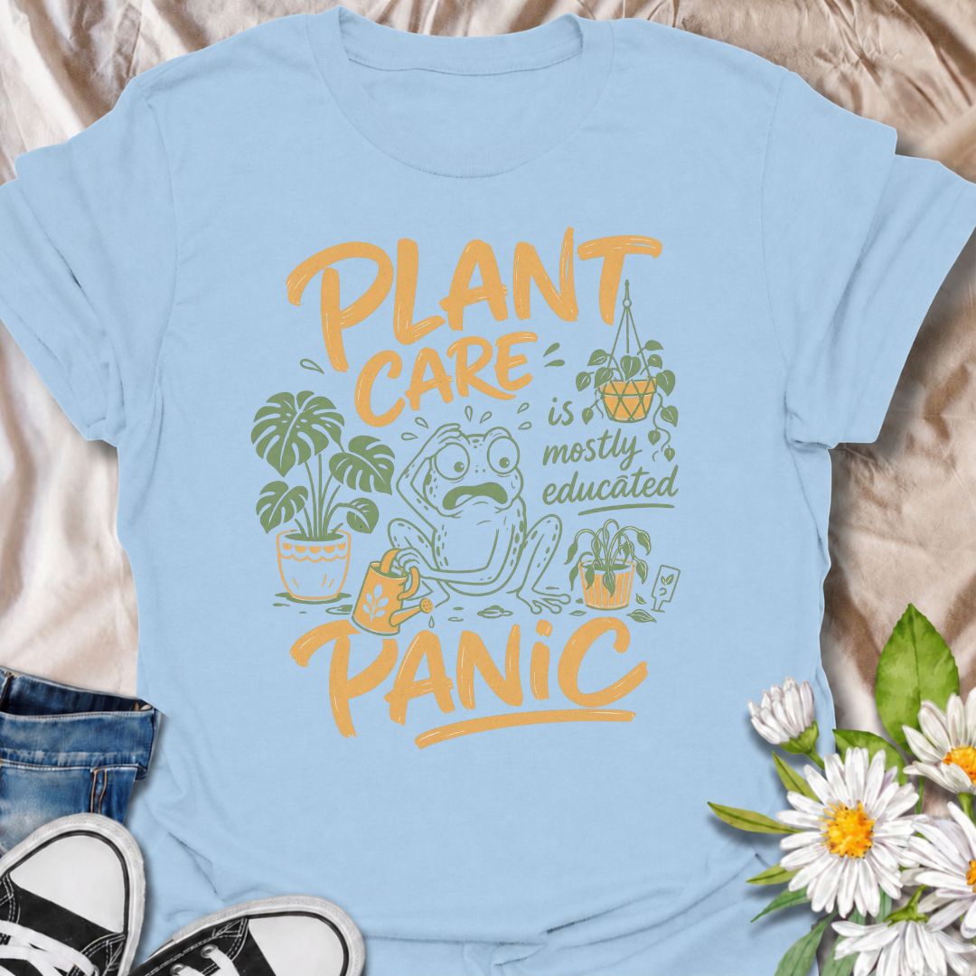 A funny plant T-shirt for anyone who has read all the care guides and still panics when a leaf starts looking slightly different. The phrase “Plant Care Is Mostly Educated Panic” perfectly captures the reality of houseplant ownership with playful, relatable humor. Featuring a worried frog surrounded by potted plants, a watering can, and plant-care chaos, this design is ideal for plant parents, indoor gardeners, and houseplant collectors. It makes a great gift for anyone who checks the soil twice, Googles ye