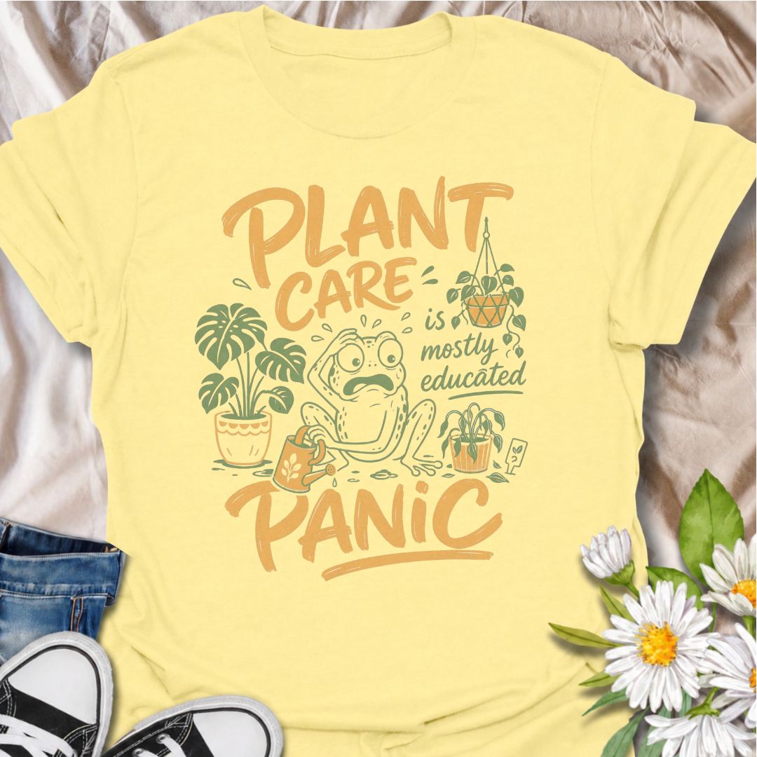 A funny plant T-shirt for anyone who has read all the care guides and still panics when a leaf starts looking slightly different. The phrase “Plant Care Is Mostly Educated Panic” perfectly captures the reality of houseplant ownership with playful, relatable humor. Featuring a worried frog surrounded by potted plants, a watering can, and plant-care chaos, this design is ideal for plant parents, indoor gardeners, and houseplant collectors. It makes a great gift for anyone who checks the soil twice, Googles ye