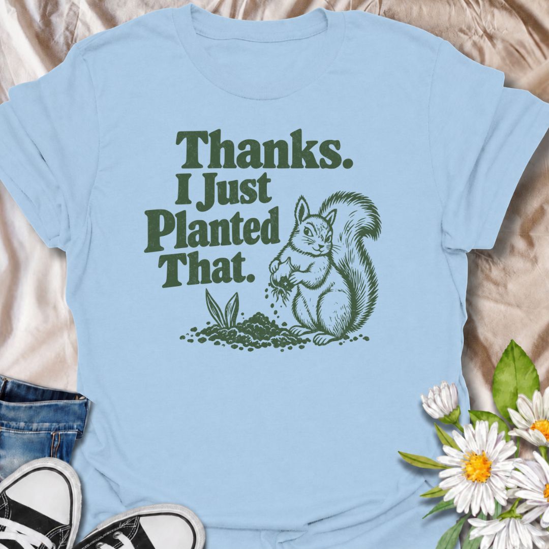A funny gardening T-shirt for anyone who has ever discovered that a squirrel has been “helping” with the planting. The phrase “Thanks. I Just Planted That.” pairs perfectly with a cheeky squirrel digging around a fresh planting spot for dry, relatable garden humor. It is ideal for backyard gardeners, flower growers, vegetable gardeners, and anyone familiar with wildlife undoing their hard work. The retro-style illustration keeps the design playful without feeling overly cute. A great gift for gardeners, squ