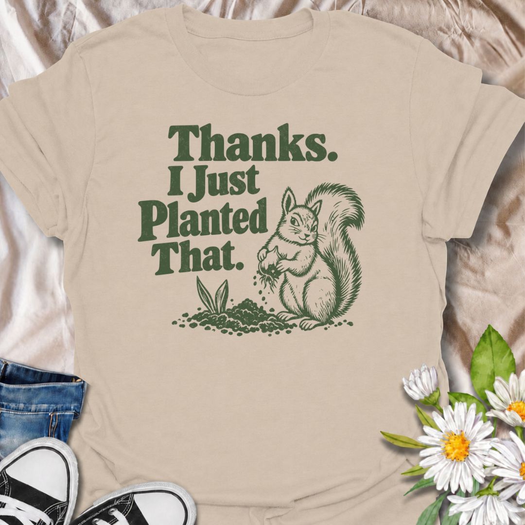 A funny gardening T-shirt for anyone who has ever discovered that a squirrel has been “helping” with the planting. The phrase “Thanks. I Just Planted That.” pairs perfectly with a cheeky squirrel digging around a fresh planting spot for dry, relatable garden humor. It is ideal for backyard gardeners, flower growers, vegetable gardeners, and anyone familiar with wildlife undoing their hard work. The retro-style illustration keeps the design playful without feeling overly cute. A great gift for gardeners, squ
