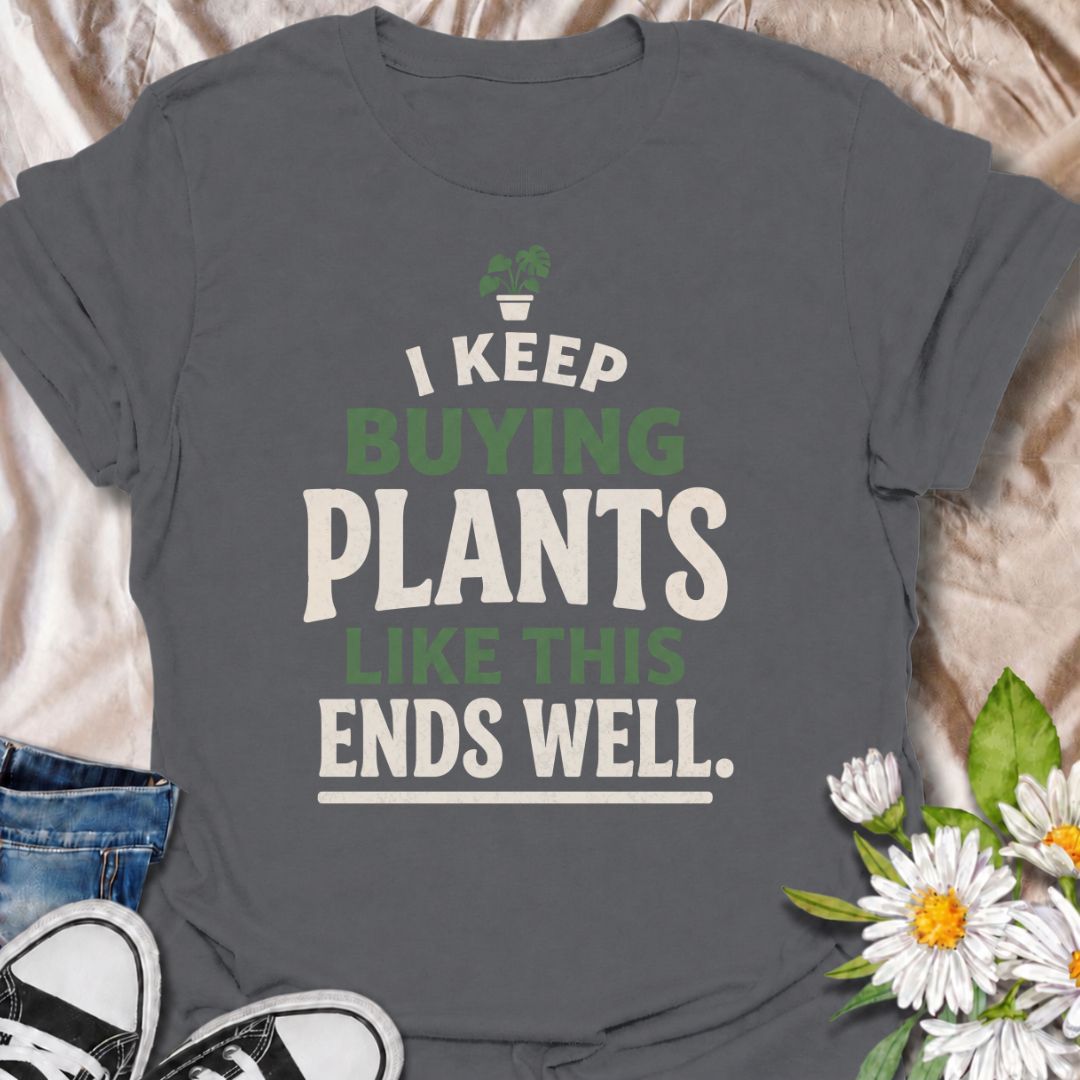 A funny plant T-shirt for anyone who keeps buying houseplants and is fully aware of where this is heading. The phrase “I Keep Buying Plants Like This Ends Well” delivers dry, self-aware humor that plant parents and collectors will instantly understand. Its bold stacked typography and tiny potted plant graphic keep the design simple, readable, and easy to wear. It makes a great gift for houseplant lovers, nursery regulars, and anyone whose indoor jungle keeps expanding despite their better judgment. Perfect 