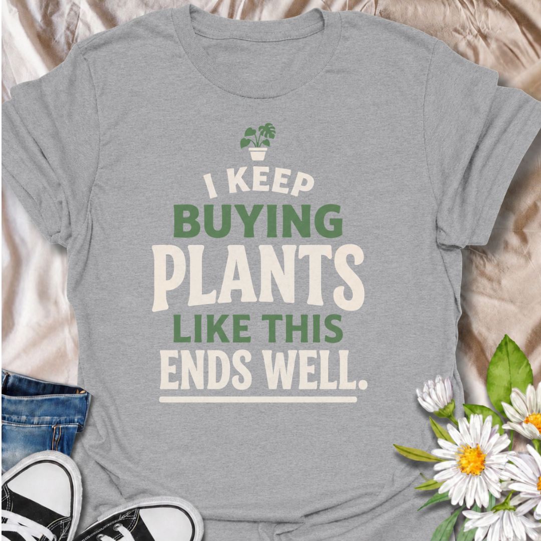 A funny plant T-shirt for anyone who keeps buying houseplants and is fully aware of where this is heading. The phrase “I Keep Buying Plants Like This Ends Well” delivers dry, self-aware humor that plant parents and collectors will instantly understand. Its bold stacked typography and tiny potted plant graphic keep the design simple, readable, and easy to wear. It makes a great gift for houseplant lovers, nursery regulars, and anyone whose indoor jungle keeps expanding despite their better judgment. Perfect 