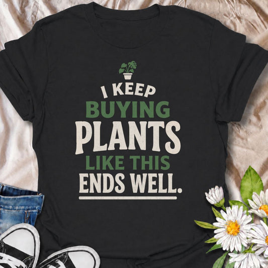 A funny plant T-shirt for anyone who keeps buying houseplants and is fully aware of where this is heading. The phrase “I Keep Buying Plants Like This Ends Well” delivers dry, self-aware humor that plant parents and collectors will instantly understand. Its bold stacked typography and tiny potted plant graphic keep the design simple, readable, and easy to wear. It makes a great gift for houseplant lovers, nursery regulars, and anyone whose indoor jungle keeps expanding despite their better judgment. Perfect 