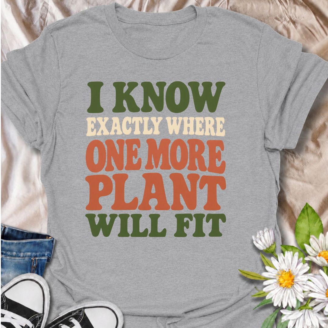 A funny plant T-shirt for anyone who can always find space for one more houseplant, no matter how full the room already looks. The phrase “I Know Exactly Where One More Plant Will Fit” perfectly captures the mindset of plant collectors, indoor gardeners, and nursery regulars. Its bold retro typography keeps the design clean, readable, and easy to wear. It makes a great gift for plant parents, houseplant lovers, and anyone whose indoor jungle keeps expanding. Ideal for nursery trips, plant swaps, garden cent