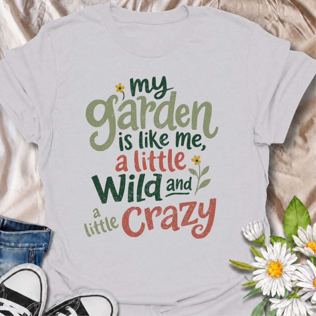 A funny gardening T-shirt for anyone who sees a little of themselves in the garden they’ve created. The phrase “My Garden Is Like Me, a Little Wild and a Little Crazy” brings personality-led garden humor to a bold, playful typography design. It is perfect for flower gardeners, cottage garden lovers, backyard growers, and anyone who prefers their garden a little less tidy and a lot more expressive. The relaxed hand-lettered style makes it feel cheerful, casual, and easy to wear. A great gift for gardeners wh