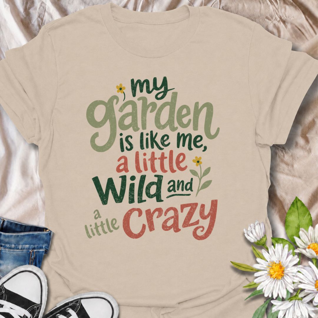 A funny gardening T-shirt for anyone who sees a little of themselves in the garden they’ve created. The phrase “My Garden Is Like Me, a Little Wild and a Little Crazy” brings personality-led garden humor to a bold, playful typography design. It is perfect for flower gardeners, cottage garden lovers, backyard growers, and anyone who prefers their garden a little less tidy and a lot more expressive. The relaxed hand-lettered style makes it feel cheerful, casual, and easy to wear. A great gift for gardeners wh