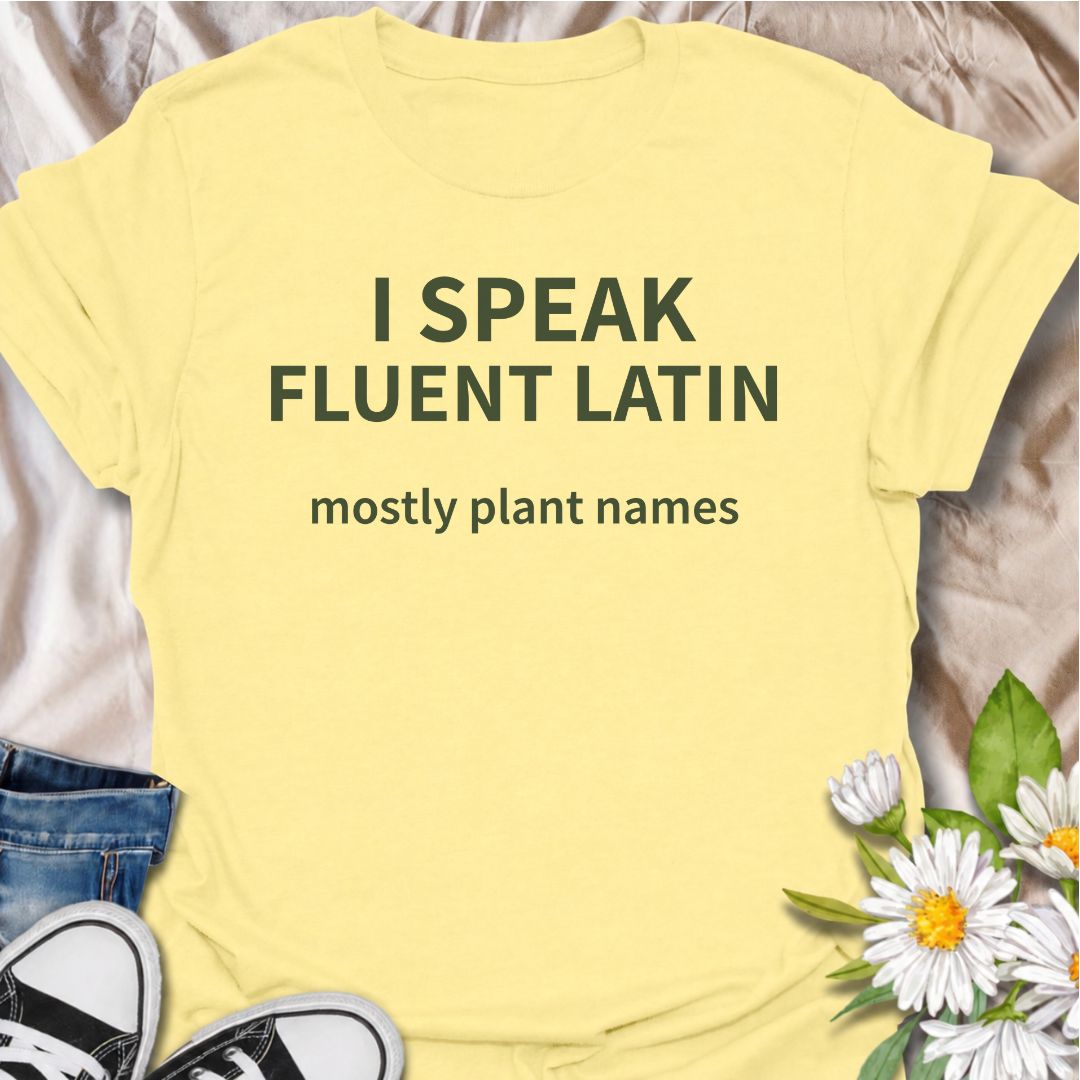 A funny plant T-shirt for gardeners who know more botanical Latin than they ever expected to learn. The phrase “I Speak Fluent Latin — Mostly Plant Names” delivers clever, niche humor for plant lovers, gardeners, and anyone who casually drops scientific plant names into conversation. Its clean typography keeps the design simple, readable, and easy to wear. It makes a great gift for horticulture fans, houseplant collectors, flower gardeners, and serious plant nerds. Perfect for nursery trips, garden centers,